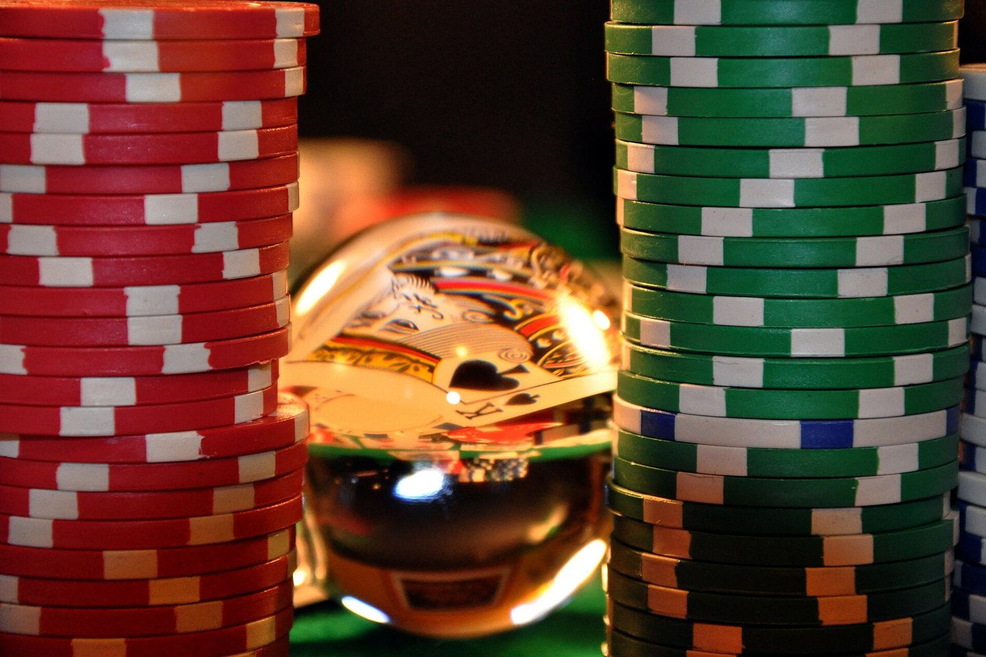 King playing card and casino tokens.